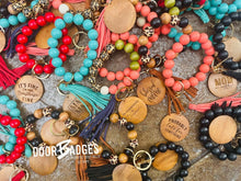 Load image into Gallery viewer, Wood/Silicone Bead Stretchy Keychain with Tassel and Engraved Charm | Custom Personalized Keychain | Bracelet Keychain Wristlet | Stocking Stuffer - DoorBadges