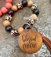 Load image into Gallery viewer, Wood/Silicone Bead Stretchy Keychain with Tassel and Engraved Charm | Custom Personalized Keychain | Bracelet Keychain Wristlet | Stocking Stuffer - DoorBadges