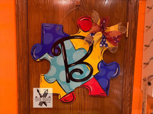 Load image into Gallery viewer, Puzzle Piece Door Hanger - Autism door Decor - wreath - Puzzle hand painted personalized door hanger - DoorBadges