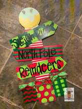 Load image into Gallery viewer, North Pole Door Hanger - Christmas Sign - Unique Gift - Holiday Door Decor - Hand Painted - DoorBadges