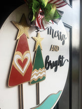 Load image into Gallery viewer, Merry and Bright 18" door hanger, 3D Winter Christmas Snow wood cut out hand painted door hanger - DoorBadges