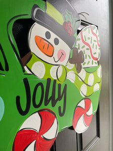 Snowman in Truck Door Hanger - Colorful Winter Door Decoration - DoorBadges