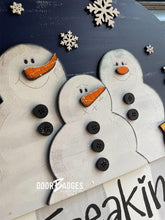Load image into Gallery viewer, Christmas Snowman Group Door Hanger - Snowman Gift -  Holiday Winter Door Decor - DoorBadges

