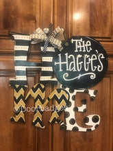 Load image into Gallery viewer, Black &amp; Gold Home wood cut out hand painted door hanger - DoorBadges
