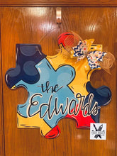 Load image into Gallery viewer, Puzzle Piece Door Hanger - Autism door Decor - wreath - Puzzle hand painted personalized door hanger - DoorBadges
