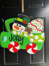 Load image into Gallery viewer, Snowman in Truck Door Hanger - Colorful Winter Door Decoration - DoorBadges
