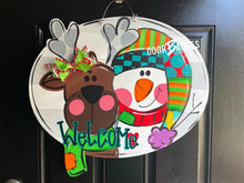 Load image into Gallery viewer, Reindeer and Santa door hanger, Winter Christmas Snow  wood cut out hand painted door hanger - DoorBadges
