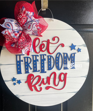 Load image into Gallery viewer, Let Freedom Ring Patriotic Doorhanger - 3D Summer Farmhouse door decor - wooden hand painted doorhanger - DoorBadges
