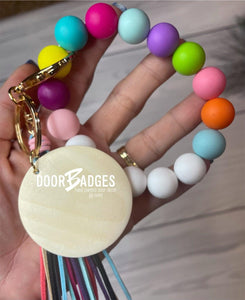 Wood/Silicone Bead Stretchy Keychain with Tassel and Engraved Charm | Custom Personalized Keychain | Bracelet Keychain Wristlet | Stocking Stuffer - DoorBadges